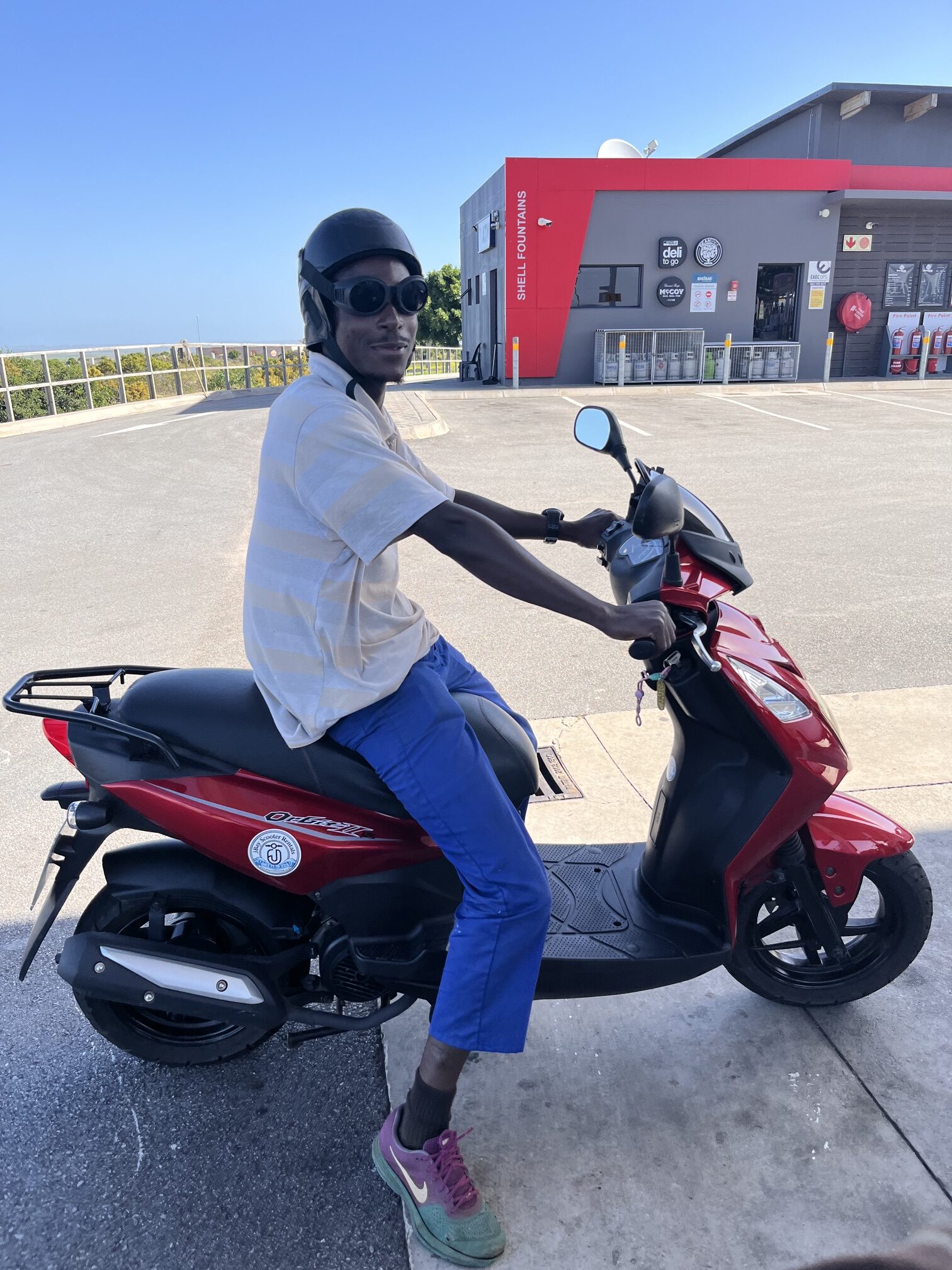 Scooter parked at a J-Bay viewpoint